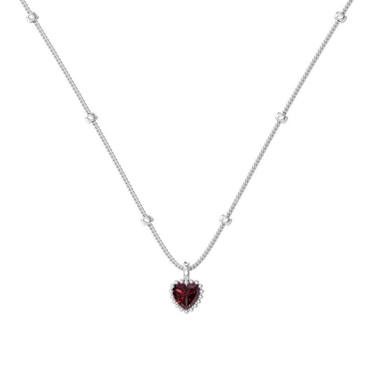 Necklace with a heart-shaped red gemstone pendant on a white background